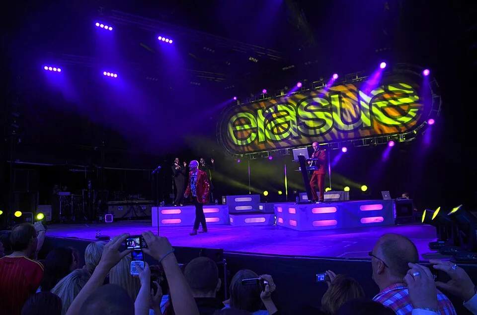 Erasure performing live at Delamere Forest, England, in 2011; archival photo, not the 2027 Radio!! Radio!! tour flyer; historical photograph of Erasure, NOT the official image of ERASURE — RADIO!! RADIO!! TOUR