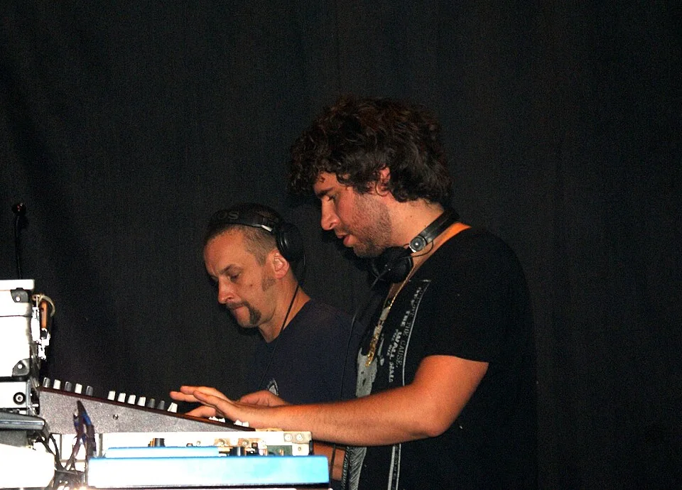 Mathew Jonson (right) performing with another member of The Modern Deep Left Quartet at Audioriver in 2010; both heads fully visible; archival photo of a billed performer at FABRIC: PALMS TRAX & OGAZÓN, not this event